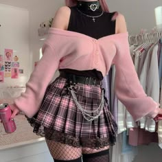 Transform your style vocabulary with our Pastel Goth Pleated Mini Skirt. Drenched in a pastel goth aesthetic, this plaid wonder comes with intricate ribbon and lace details, setting you apart from the crowd. The zip side fastening and lace-up detail offer comfort, fit and a unique edge. Unleash your inner fashionista at gatherings or leisurely hangouts. Add black fishnet stockings and a crop top, and let your outfit narrate your style story. Pastel goth aesthetic Plaid Ribbon & lace details Zip Girly Emo, 00s Mode, Emo Fits, Pastel Goth Fashion, Goth Aesthetic, Swaggy Outfits, Alternative Outfits, Goth Outfits, Plaid Skirt