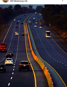 many cars are driving down the highway at night time with bright yellow lights on them