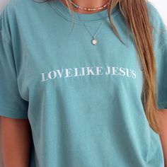 Embrace the message of love and compassion with our "Love Like Jesus" embroidered tee. This inspiring Christian shirt is designed to remind you to spread love and kindness in your everyday life, reflecting the teachings of Jesus. Brighten your wardrobe with The White Invite's Christian T-Shirts, where faith meets fashion in Comfort Colors brand! These casual, inspirational tees are your perfect everyday companion, blending uplifting messages with a cozy fit to keep you smiling and inspired. Whet Love Like Jesus Shirt, Beach Bachelorette Party Shirts, Love Like Jesus, Love And Kindness, Patriotic Tees, Christian T Shirts, Inspirational Tees, Mama Tee, Embroidered Tee