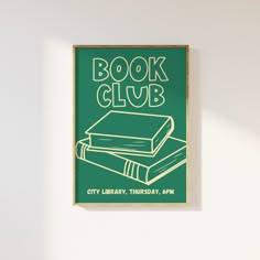 a green book club poster hanging on the wall