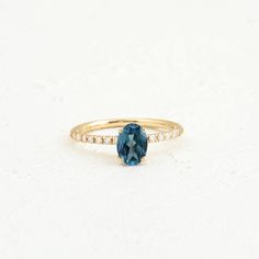 Description : Oval Blue Sapphire Engagement Ring, Solid Gold  Sapphire Wedding Ring, Dainty Blue Sapphire Gemstone Ring, Black Friday Sale Diamond : 0.18 CT. F / SI (14 piece) Natural Teal Sapphire : 1.25 CT. (1 piece) Gram 1.98 (It may differ depending on the ring size) Product Code: MR0014597-TSP This product belongs to Tilya Jewelery private collection . You can browse our store for other special collection products. All of our products are stamped and made of solid gold . All of our products Blue Promise Rings With Diamond Accents, Blue Gemstone Promise Rings, Blue Diamond Promise Ring With Accent Stones, Blue Oval Birthstone Ring With Diamond Accents, Blue Sapphire Wedding Ring With Diamond Accents, Oval Sapphire Ring For Promise, Blue Oval Birthstone Promise Ring, Blue Birthstone Ring With Diamond Accents For Wedding, Oval Blue Birthstone Ring For Wedding