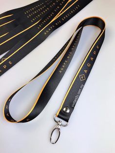 the lanyard strap is black and gold