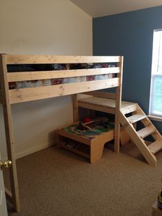 a bunk bed with stairs in a bedroom