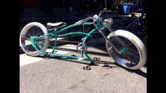 an unusual looking bike is parked on the street