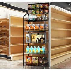 an empty grocery store with shelves full of food and drinks in it's display cases