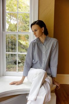 Our new Greta shirt strikes the perfect balance between tailored and casual. With a high stand collar and barrel cuff, this button up stripe shirt stands on its own is sure to become your new every day staple. Try this smart casual work outfit today, and follow for more capsule wardrobe, outfit ideas, and spring 2023 fashion trends. Capsule Wardrobe Outfit Ideas, Smart Casual Work Outfit, Smart Casual Work, Summer Sweatshirt, 2023 Fashion Trends