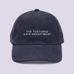 Elevate your fashion game with The Tortured Gays Department Hat and have fun at the Eras Tour. This embroidered old-school cap is more than just a hat; it's a statement of pride, humor, and contemporary culture. Crafted from 100% cotton corduroy, it offers a blend of comfort and style that's perfect for any occasion. 💬 Embrace the Satire Showcase your unique sense of humor with The Tortured Gays Department design. This high-quality embroidery adds a playful yet poignant touch to your look. It's Pride Humor, Romance Movie, Gay Gifts, Corduroy Cap, Funny Hats, Lgbtq Pride, Eras Tour, Satire, Metal Buckles