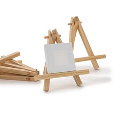 an easel and canvas on a white background