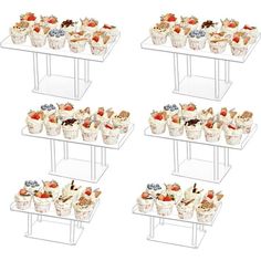 four tiered trays filled with different types of desserts