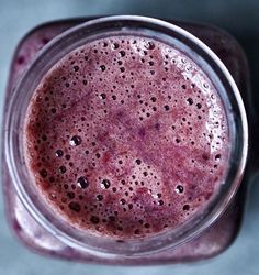 a close up view of a smoothie in a blender