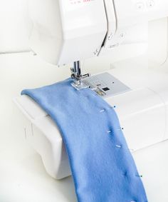 a sewing machine with a blue cloth on it