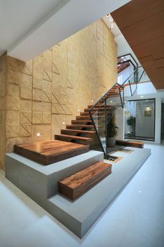 the stairs are made of concrete and wood