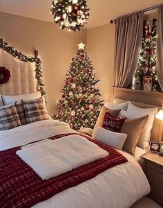 a christmas tree in the corner of a bedroom