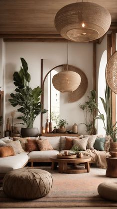 a living room filled with lots of furniture and plants