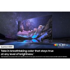 an advertisement for the new htcr tv, featuring mountains and stars in the sky