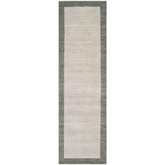 a white and grey runner rug on a white background with an area rug in the middle