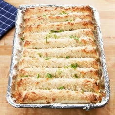 an uncooked casserole dish on a wooden table