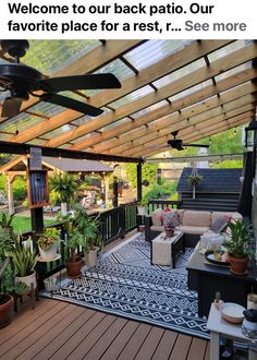 an outdoor patio with lots of plants and furniture on the deck, along with a ceiling fan that reads welcome to our back patio our favorite place for rest