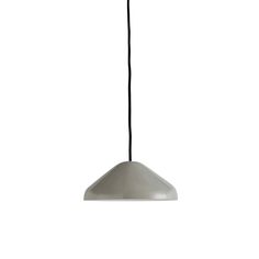 a white light hanging from a black cord