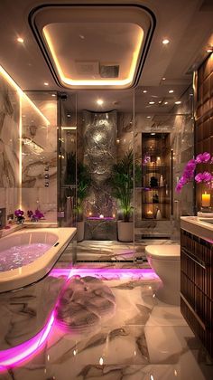 a fancy bathroom with marble floors and purple lights on the ceiling, along with a large bathtub