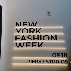 the new york fashion week sign is lit up