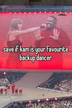 two people standing in front of a large screen with the words save if kim is your favorite backup dancer