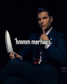 a man in a suit holding a knife with the words mmmm merhaps on it