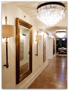 the hallway is clean and ready for guests to use it as a light fixture in the house