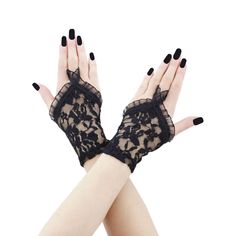 Lace gloves are a classic and elegant accessory that can add a touch of sophistication to any outfit, especially for women. Whether worn with a formal dress for a special occasion or with a more casual ensemble to add a bit of flair, lace gloves have a timeless appeal that can elevate any look. They are often associated with femininity and grace, making them a popular choice for adding a delicate and romantic touch to one's style. fingerless gloves short of lace for gothic style  short fingerles Victorian Gloves, Floral Gloves, Gothic Burlesque, Black Lace Gloves, Burlesque Vintage, Beach Sunscreen, Black Fingerless Gloves, Gloves Lace