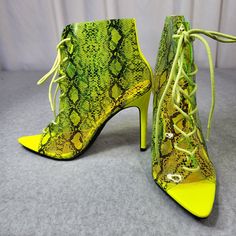 New Cape Robbin Translucent Neon Yellow Lime Snake Print Open Toe With Lace Up Front 4.25" (Approx) Stiletto Heel Cushioned Insoles Lime Green Heels For Spring Party, Summer Yellow Ankle-high Heels, Lime Green Open Toe Party Heels, Lime Green Open Toe Heels For Party, Yellow High Heel Party Shoes, Neon Yellow Fitted High Heels, Fitted Neon Yellow High Heels, Yellow Ankle-high Heels For Party, Trendy Green Ankle-high Heels