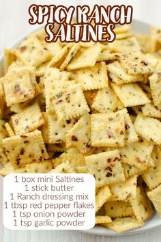 the recipe for spicy ranch saltine crackers is shown on a white plate with text overlay