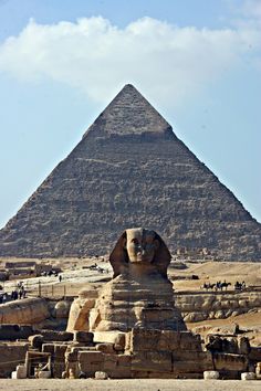 the great sphinx in front of the pyramid