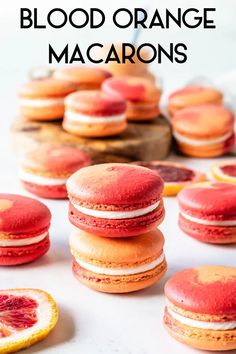 blood orange macarons are stacked on top of each other with the words blood orange macaroons above them