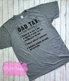 a t - shirt with the words dad tax printed on it