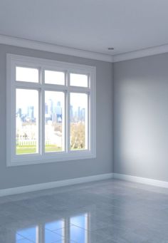 an empty room with large windows and tile flooring in front of the cityscape