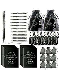 black and white photo of pens, notebooks, and bags with writing on them