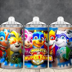 three children's sippy cups with the characters of paw patrol and super hero