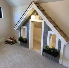 a dog house made out of cinder blocks with plants growing in the top and bottom