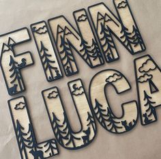 some type of wood cut out with the words fink lunch and trees on it