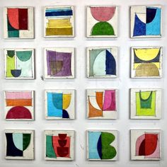 nine abstract paintings are displayed on a white wall, each with different shapes and colors