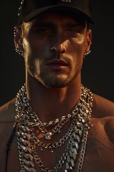 a shirtless man with multiple chains on his chest and hat over his head, wearing a baseball cap