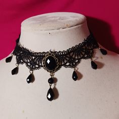 Nwot Vintage Victorian Gothic Black Lace Fashion Choker Necklace Water Drop Beads And Pendant Are Hard Durable Plastic And Have Good Weight To Them Brass Colored Hardware And Findings Closure Is Lobster Claw Style Clasp Necklace Is 13 Inches In Length And Adjustable With 2 Inch Long Extender Chain All Reasonable Offers Considered And Will Be Accepted Or Countered. **Notice** And Disclaimer For People With Allergies: I Live With A Smoker And My Items Do Come From A Pet Friendly Home. Great Care I Victorian Goth Necklace, Formal Black Choker, Elegant Handmade Black Choker, Adjustable Vintage Black Choker, Black Bohemian Necklace For Formal Occasions, Bohemian Black Necklace For Formal Occasions, Vintage Black Beads Choker Gift, Vintage Black Choker For Gifts, Vintage Black Choker For Party