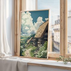 a window sill with a painting on it next to a white curtain and windowsill