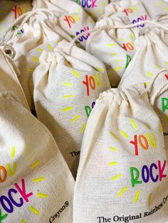 several bags with the words rock written on them