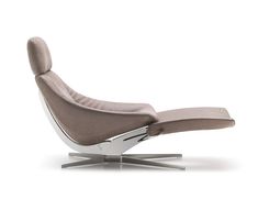 the reclining chair is upholstered with an adjustable footrest and back rest