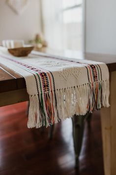 a table with a white blanket on top of it