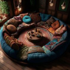 a living room filled with lots of furniture and pillows on top of a round rug