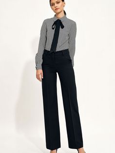 After many seasons of the dominance of slim-fitting pants, models with wide legs, the so-called wide leg, have returned. Pants with loose legs look perfect in a set with a jacket of the same color, creating an elegant total look. The pants have a raised top, so they optically lengthen the silhouette. Spandex 2.1 % Polyester 74.8 % Viscose 23.1 % Size Lenght Hips width Waist width 36 106 cm 95 cm 73 cm 38 106.5 cm 99 cm 77 cm 40 107 cm 103 cm 81 cm 42 107.5 cm 107 cm 85 cm 44 108 cm 111 cm 89 cm Classic Wide-leg Office Pantsuit, Chic Tailored Wide Leg Pants For Business Casual, Semi-formal Pantsuit For Fall, Fall Business Pantsuit Trousers, Semi-formal Fall Pantsuit, Fall Semi-formal Pantsuit With Trousers, Semi-formal Wide-leg Pants For Fall, Elegant Business Casual Wide Leg Pants For Fall, Elegant Wide Leg Pants For Business Casual, Fall