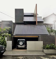 a car is parked in front of a house