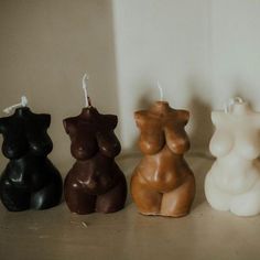 three candles shaped like bears sitting next to each other